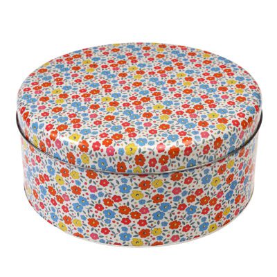 koekblik rond gekleurde bloemen