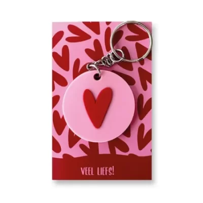 ronde roze sleutelhanger met rood hartje